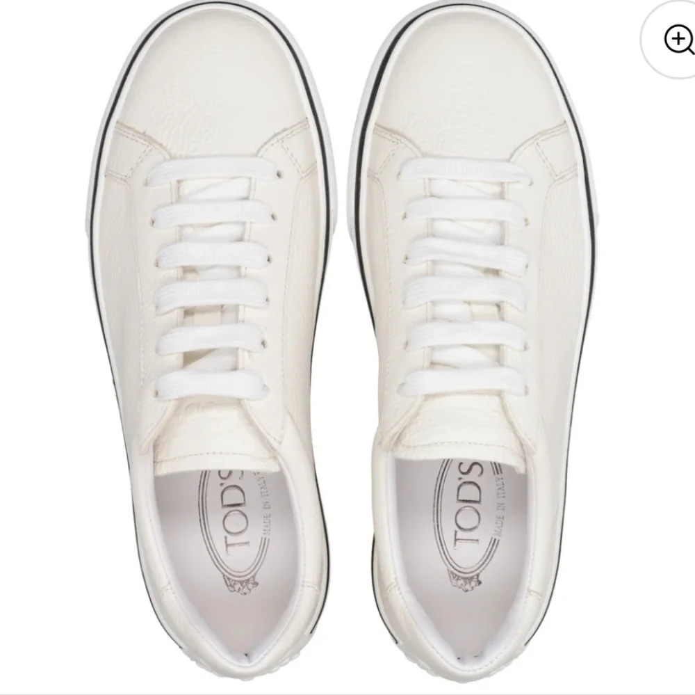 Tod's Cream Leather Low-Top Sneakers with Black Stripe